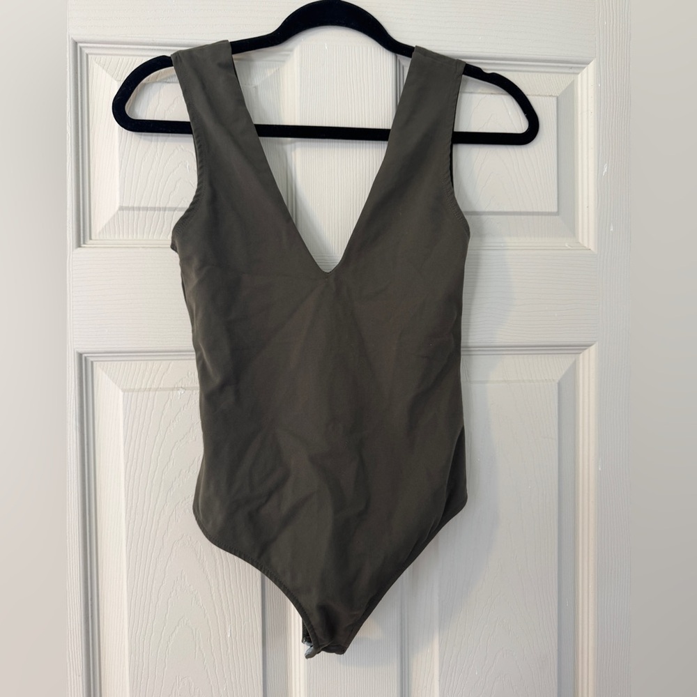 Like new intimately free people Olive Green body suit sz XS